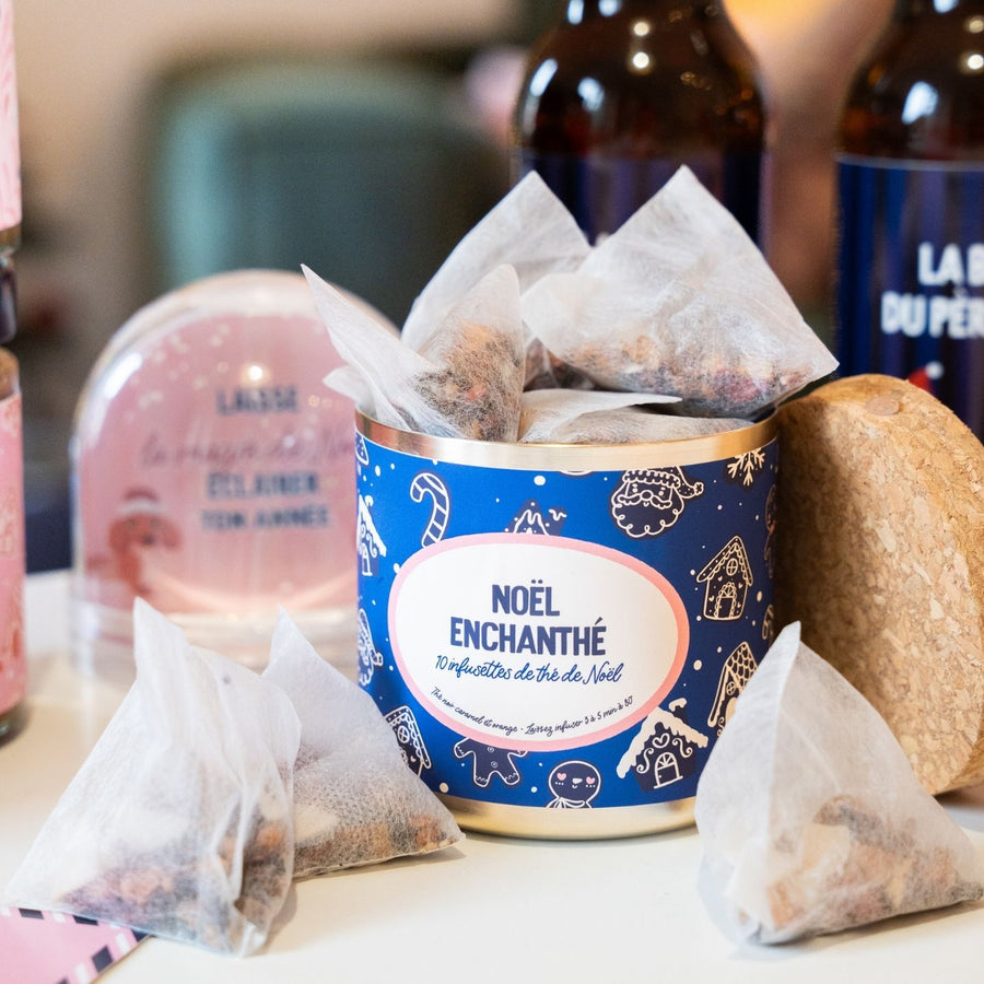 Boîte de thé Noël Enchanthé avec motifs festifs et dorés