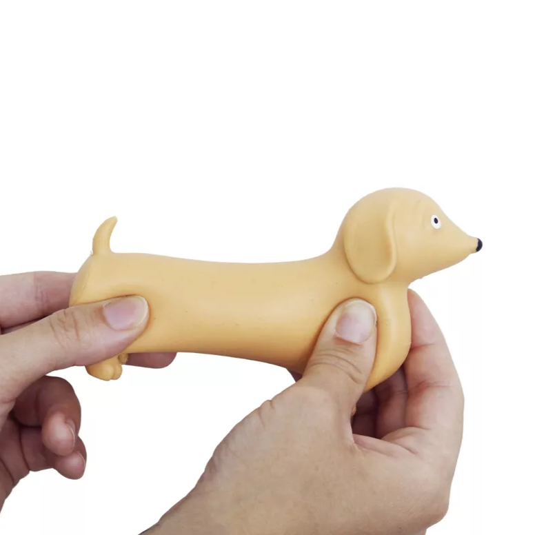 Balle anti-stress teckel Henry, vue de face avec expression joyeuse.