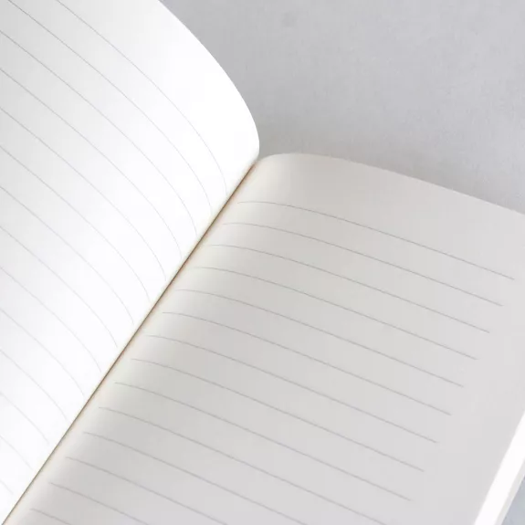 Petit carnet avec motifs de timbres du monde entier