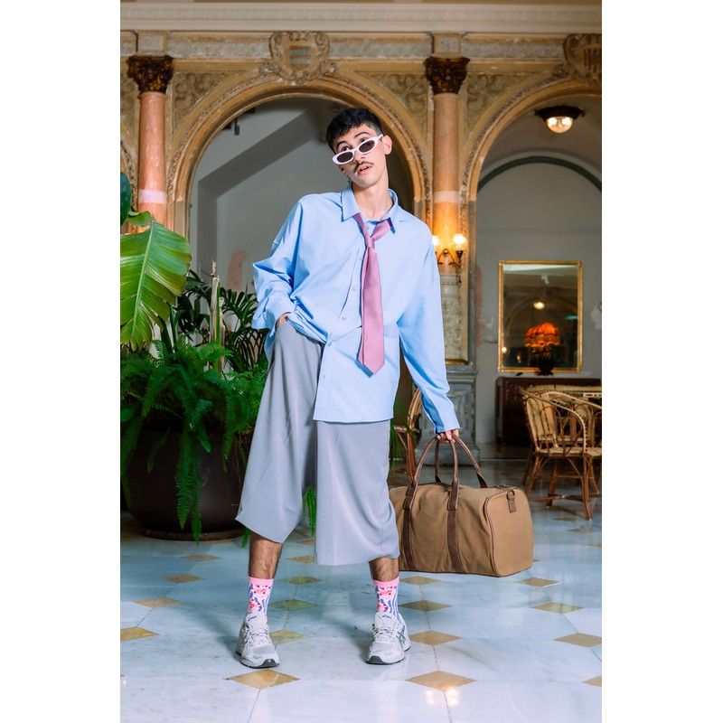 Chaussettes mi-hautes avec motif de gâteau coloré en détail.