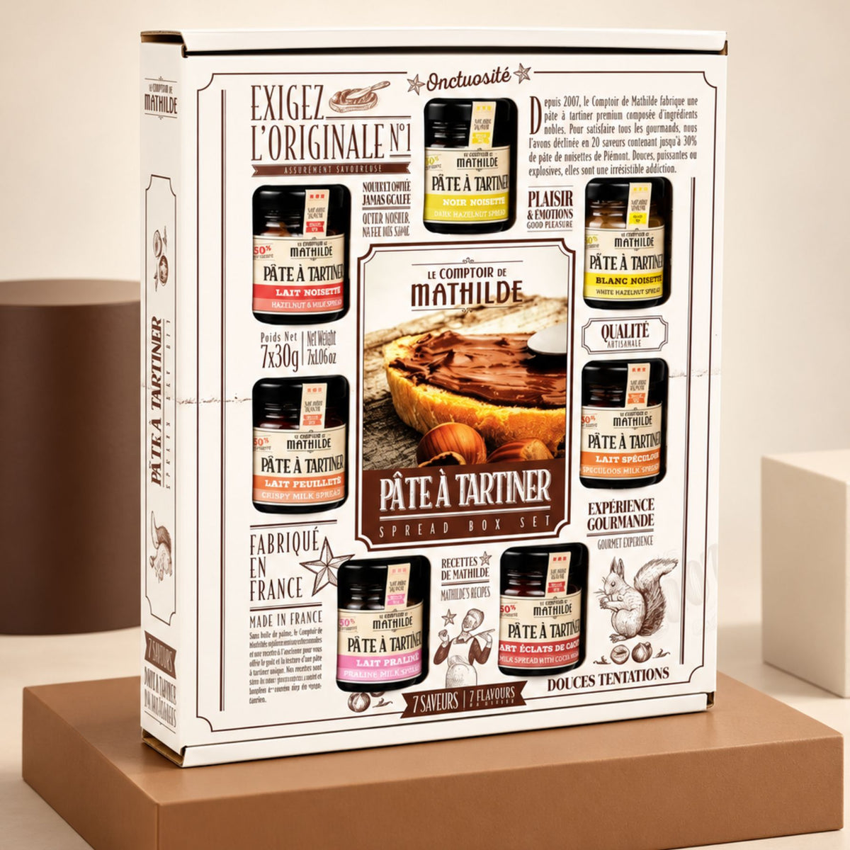 Coffret de 7 mini pâtes à tartiner colorées en présentation