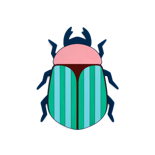 Dessous de plat en forme de scarabée avec motifs colorés.