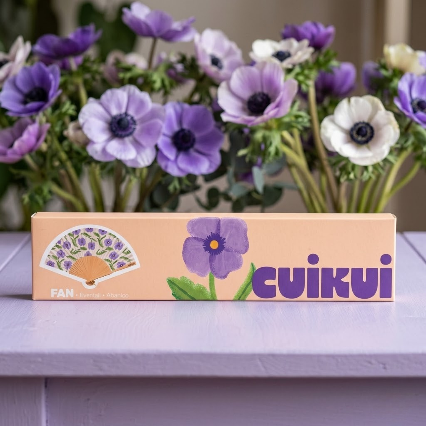 Éventail CUIKUI avec motif d'anémones sur toile résistante