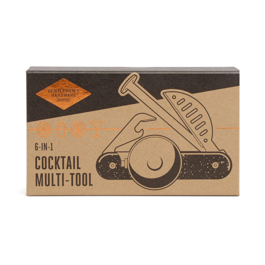 Kit de création de cocktails avec accessoires variés en vue de dessus.
