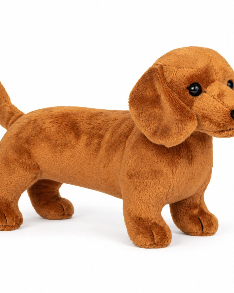 Peluche teckel en position assise, détails de la texture douce