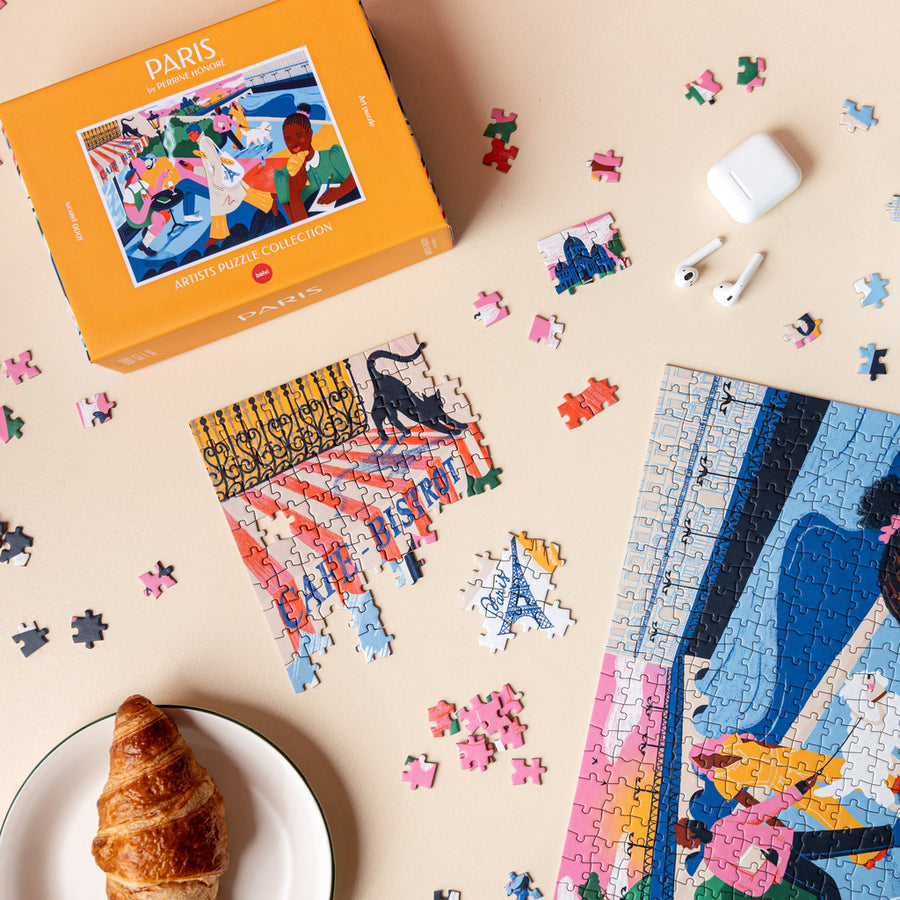 Puzzle représentant la Tour Eiffel avec des détails colorés