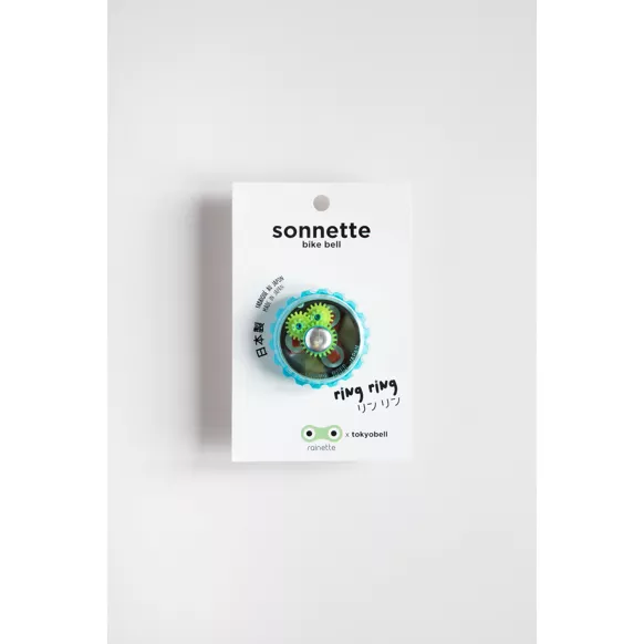 Sonnette de vélo avec coque transparente et mécanisme visible