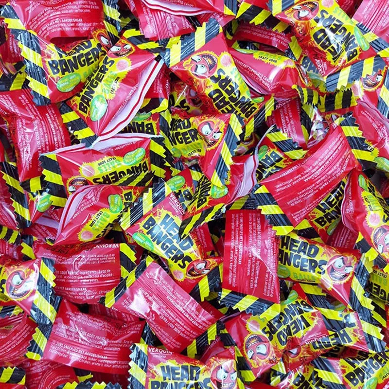 Têtes brulées fraises en gros plan, texture brillante et colorée.