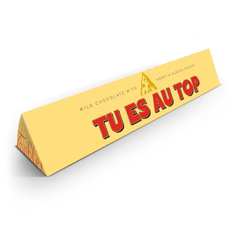 Barre Toblerone avec inscription 'Tu es au top' en gros plan.