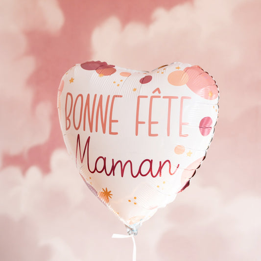 Ballon cœur 'Bonne Fête Maman' avec motif coloré et brillant.