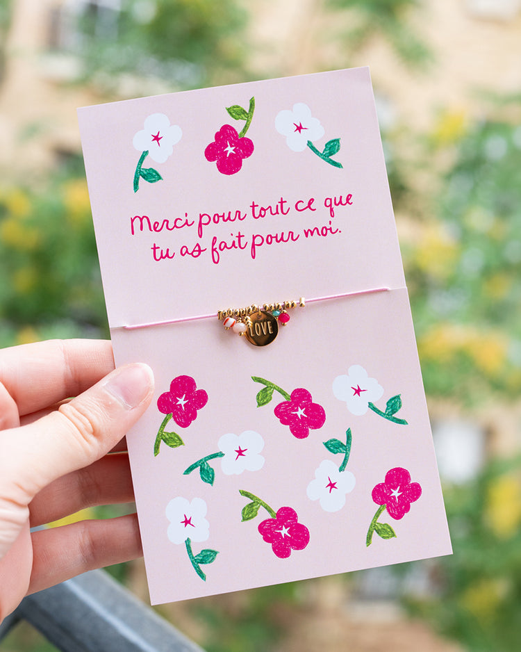Bracelet doré en trèfle avec carte message de remerciement