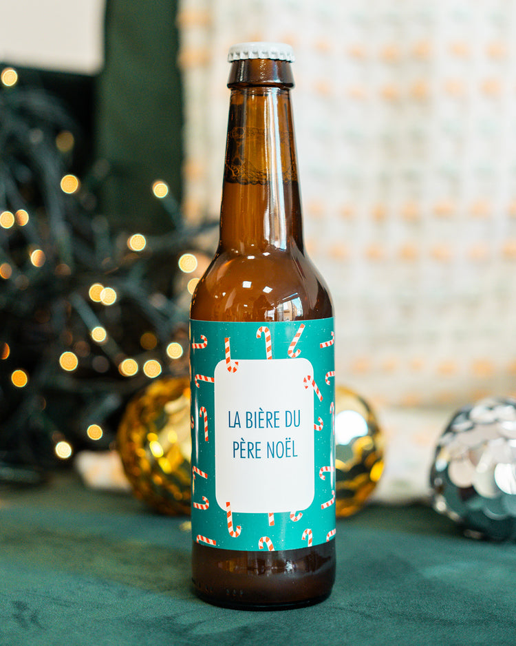 Bière Père Noël avec étiquette festive et design coloré.
