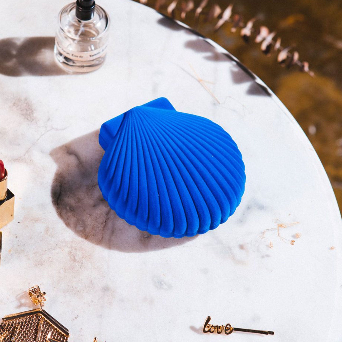 Boîte à bijoux en forme de coquillage vue de dessus