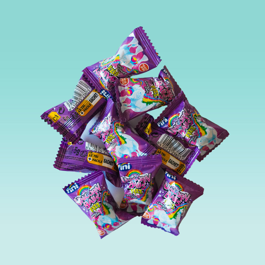 Boules de licorne colorées avec texture brillante et festive.