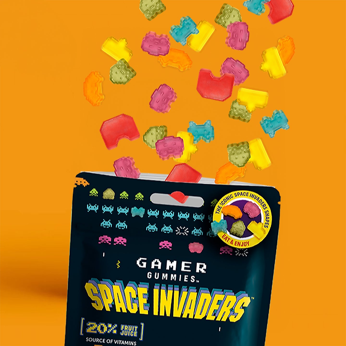 Bonbons Space Invaders en forme d'aliens colorés sur fond clair.