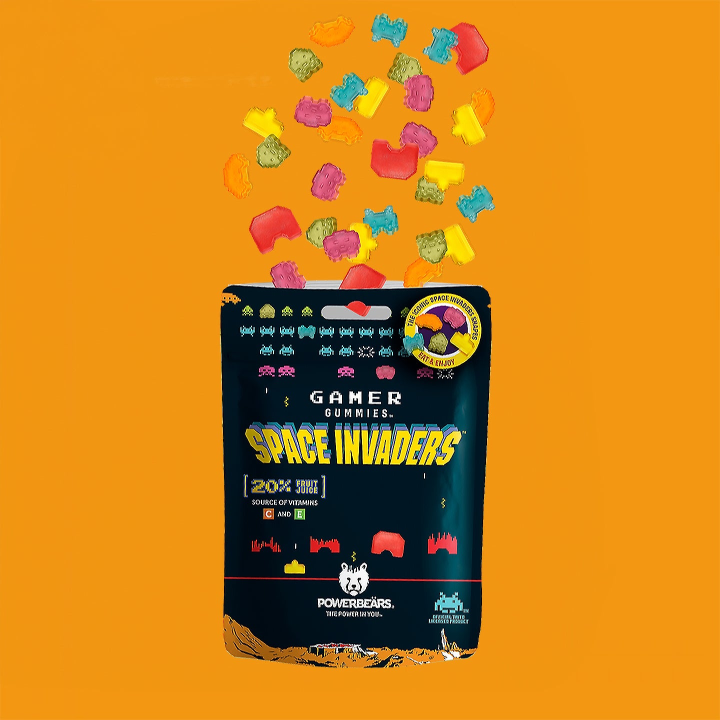 Bonbons Space Invaders en forme d'aliens colorés sur fond clair.