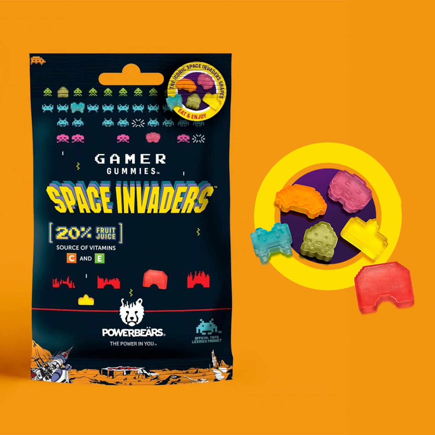 Bonbons Space Invaders en forme d'aliens colorés sur fond blanc.
