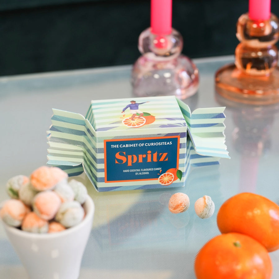 Bonbons Orange Spritz en gros plan, texture brillante et colorée.