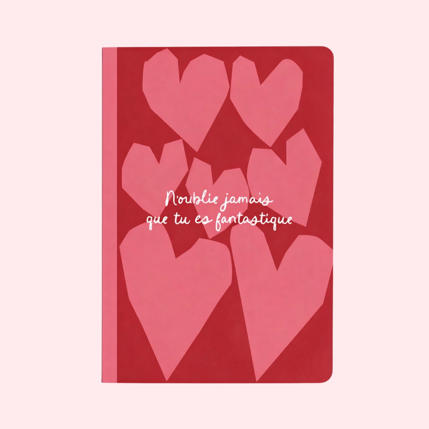 Carnet coloré avec des cœurs, message inspirant en couverture