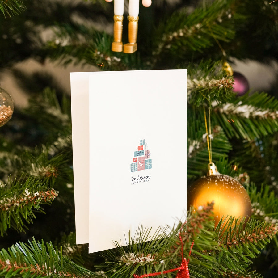 Carte de Noël avec motif 'Ho Ho Ho' sur fond givré.