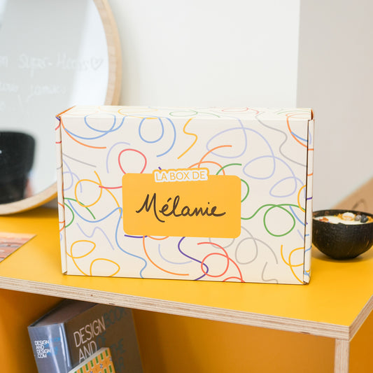 Cool box personnalisable avec motif de confettis colorés.