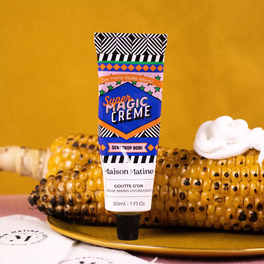 Crème mains Super Magic avec texture crémeuse et tube élégant.