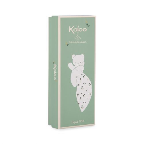 Doudou ourson avec motifs de feuilles, doux et apaisant.