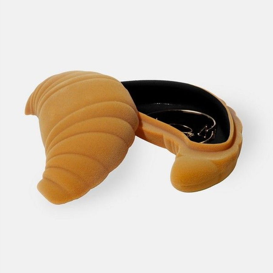 Boîte à bijoux en croissant avec texture douce et élégante