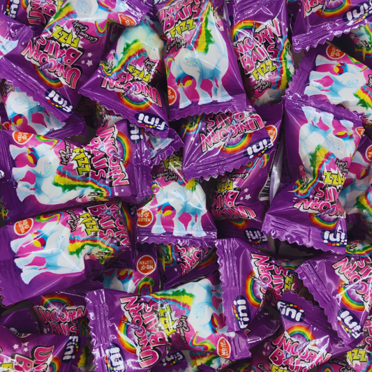 Boules de licorne colorées avec un motif festif et joyeux.