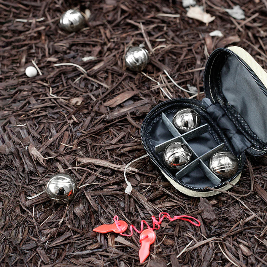 Mini boules lestées sur fond neutre, prêtes à jouer