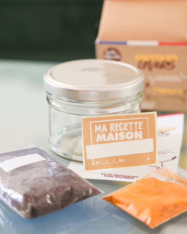 Kit DIY pour moutarde avec épices bio et instructions claires.