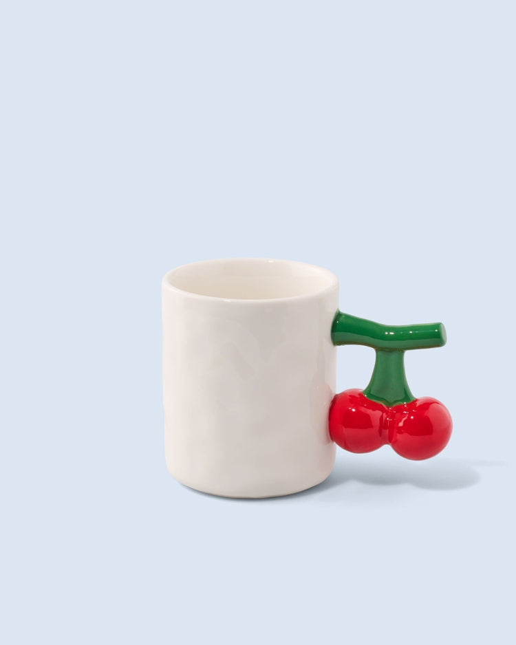 Mug en céramique avec motif cerise sur fond blanc