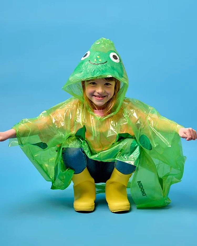Poncho de pluie avec motif animalier, porté sous la pluie