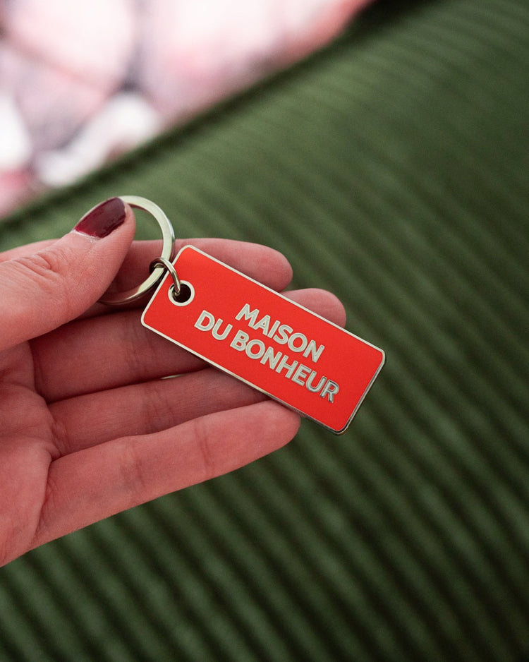 Porte-clé en forme de maison avec détails en relief