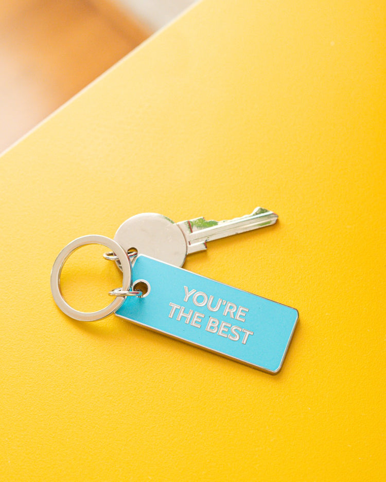 Porte-clé mignon avec inscription 'You're the Best' en gros plan.