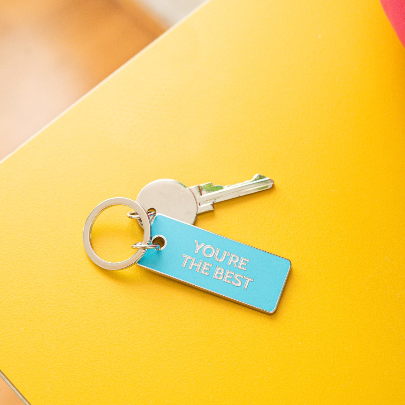 Porte-clé mignon avec inscription 'You're the Best' en gros plan.