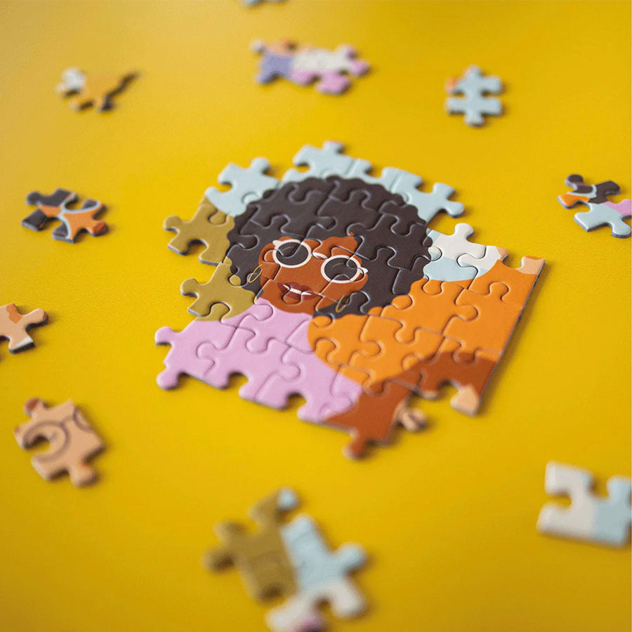 Puzzle de 500 pièces représentant des femmes diverses.
