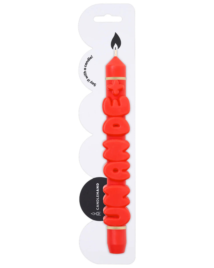 Bougie 'Un an de +' avec motif orange sur fond blanc