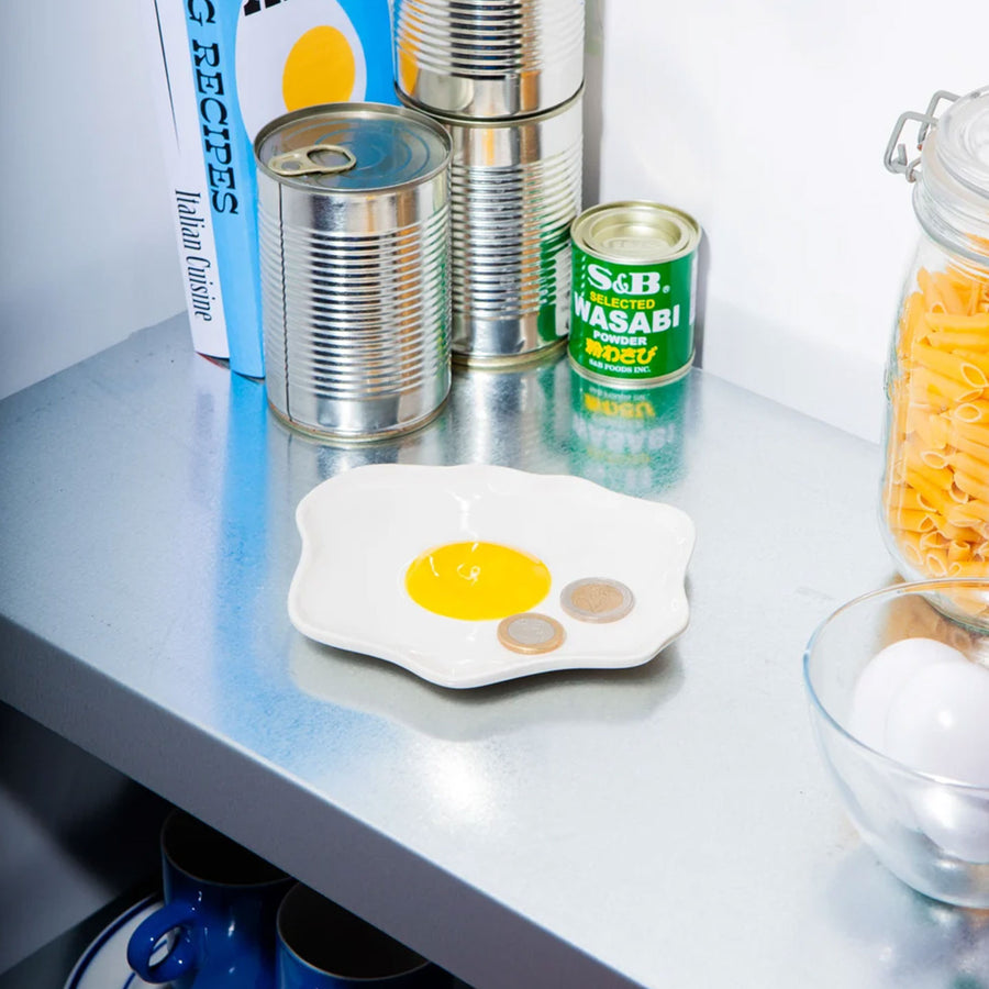 Vide poche en forme d'œuf au plat, vue de dessus