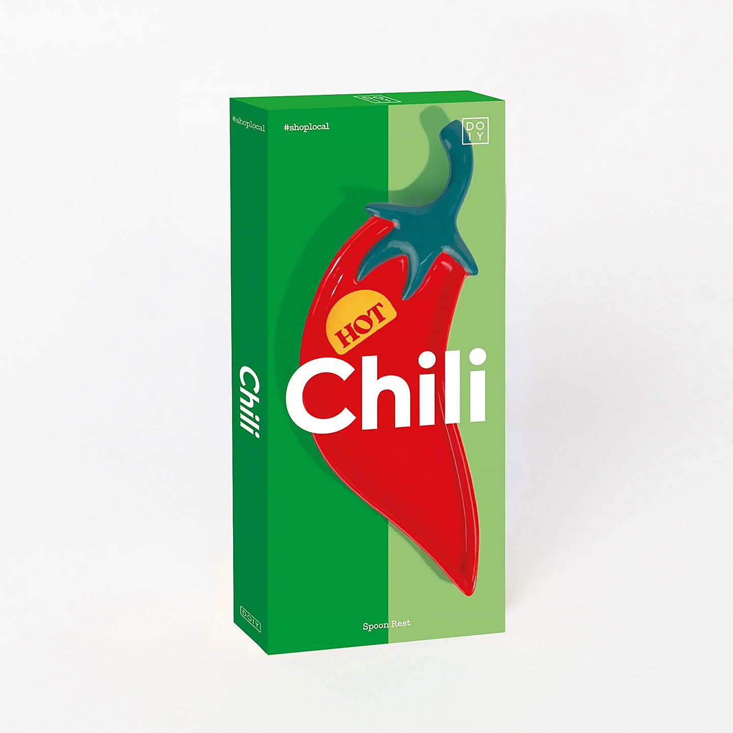 Repose cuillère en forme de piment sur fond blanc