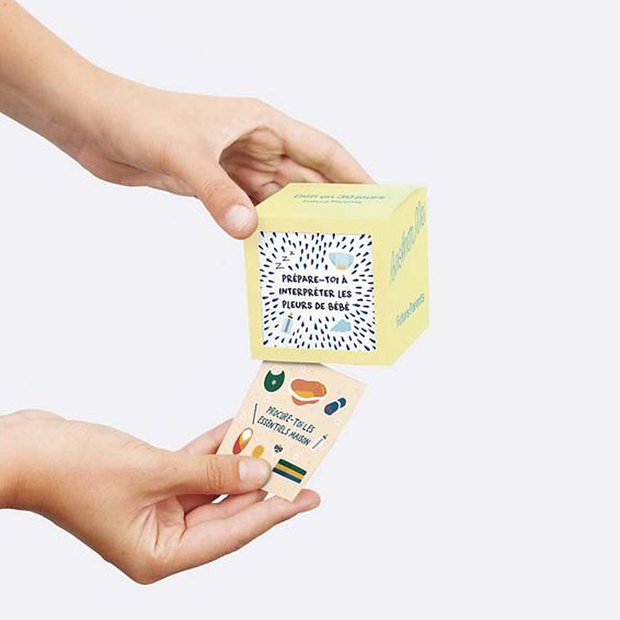 Livre 30 jours de défis Futurs Parents avec illustrations de jeunes parents souriants.