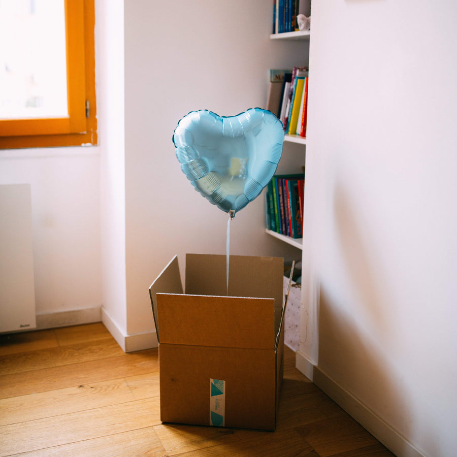 Ballon coeur bleu perle, idéal pour offrir en cadeau d'amour ou d'amitié.