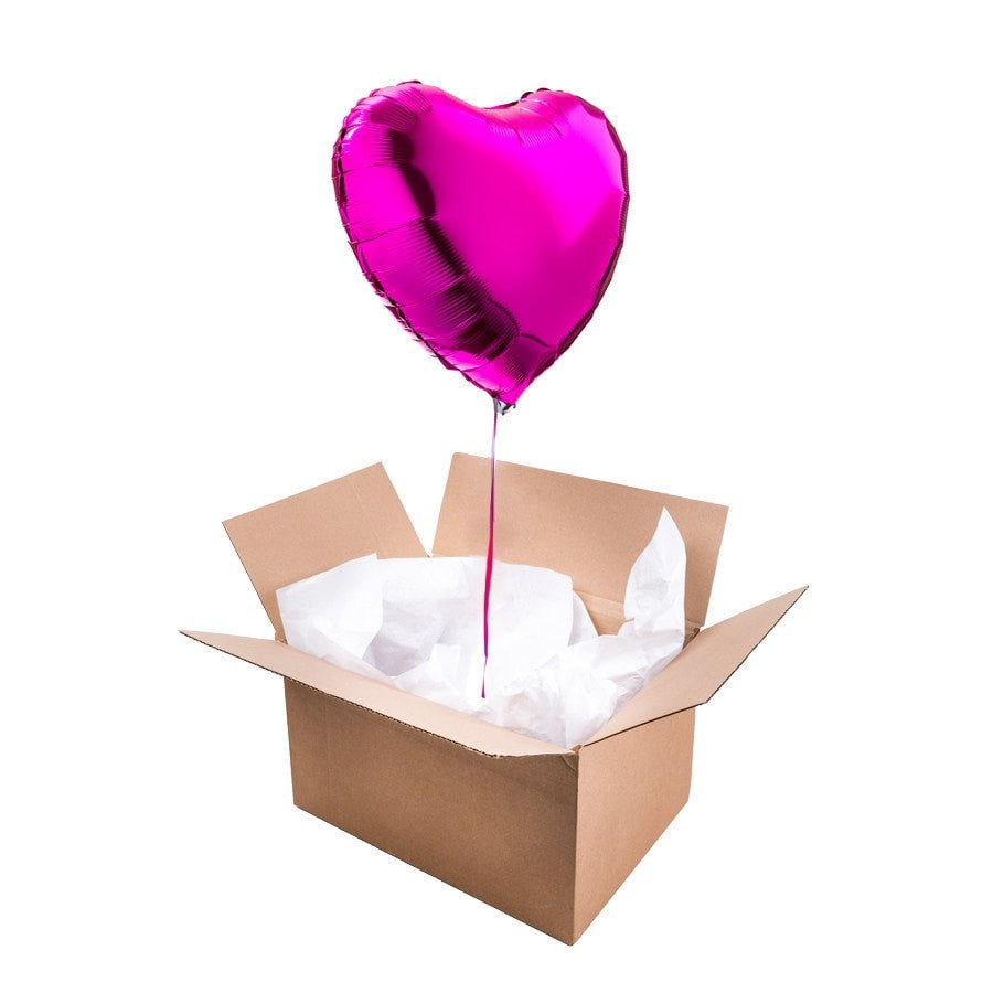 Ballon coeur rose magenta, idéal pour offrir en cadeau d'amour ou d'amitié.