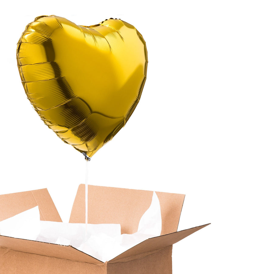 Ballon coeur doré pour une décoration romantique.