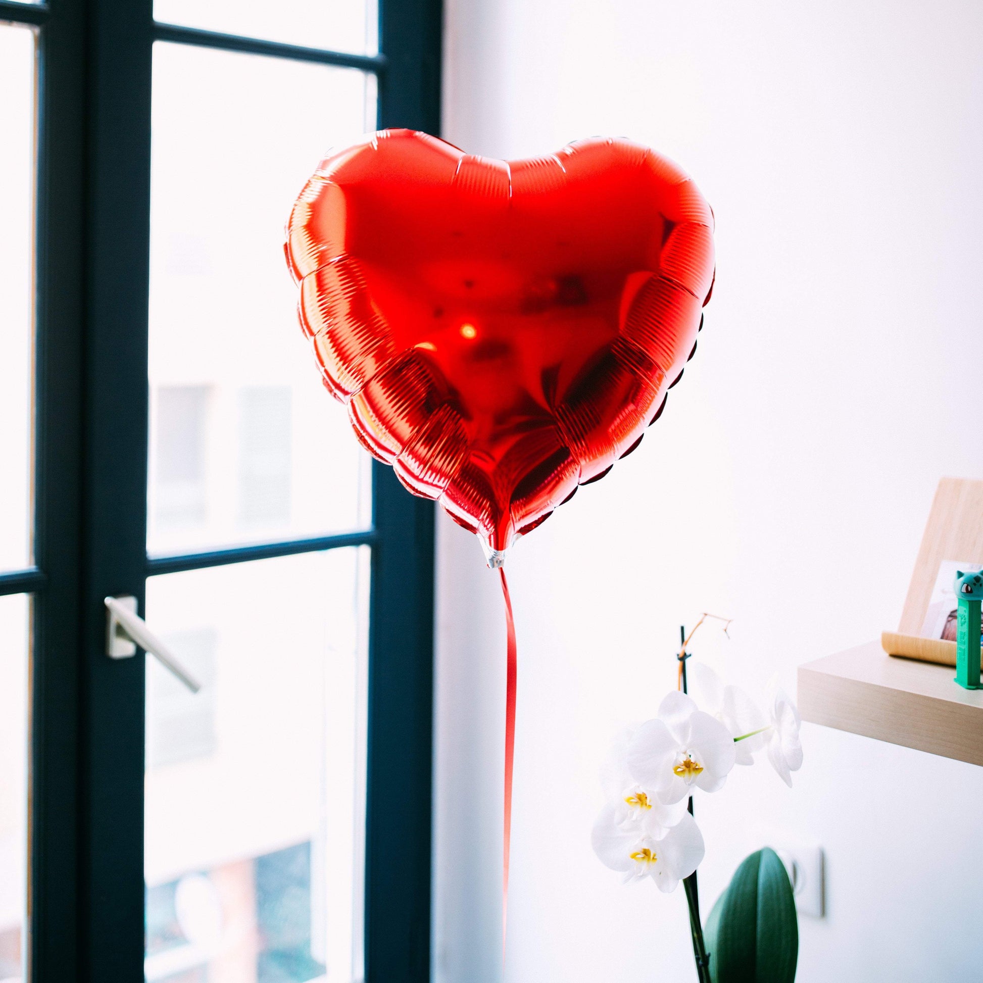 Ballon en forme de coeur rouge pour une livraison originale