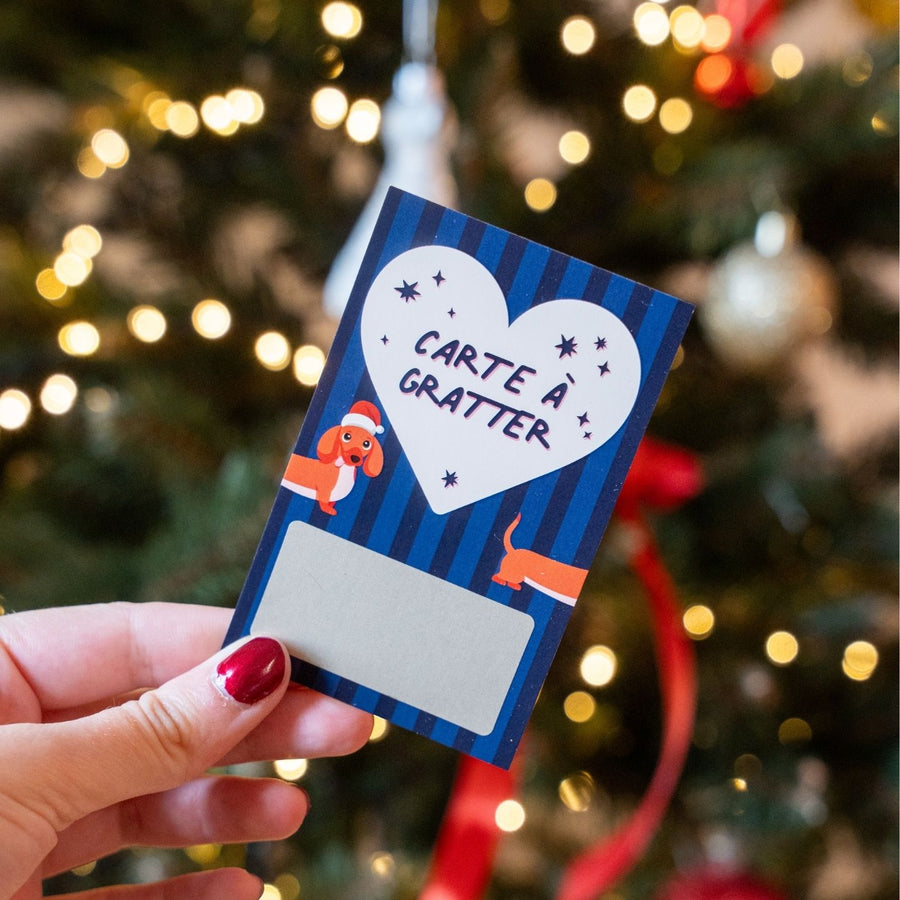 Carte à gratter avec un teckel et un message festif