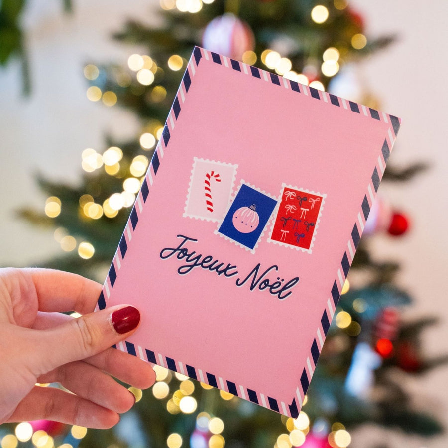 Carte postale Joyeux Noël avec timbres illustrés colorés