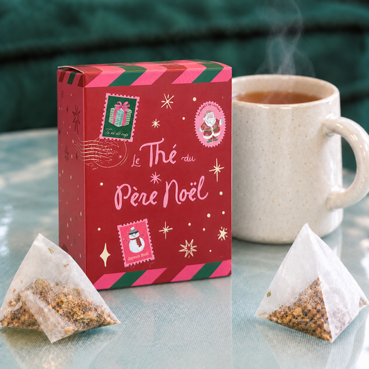 Boîte rouge du Thé du Père Noël avec infusettes visibles