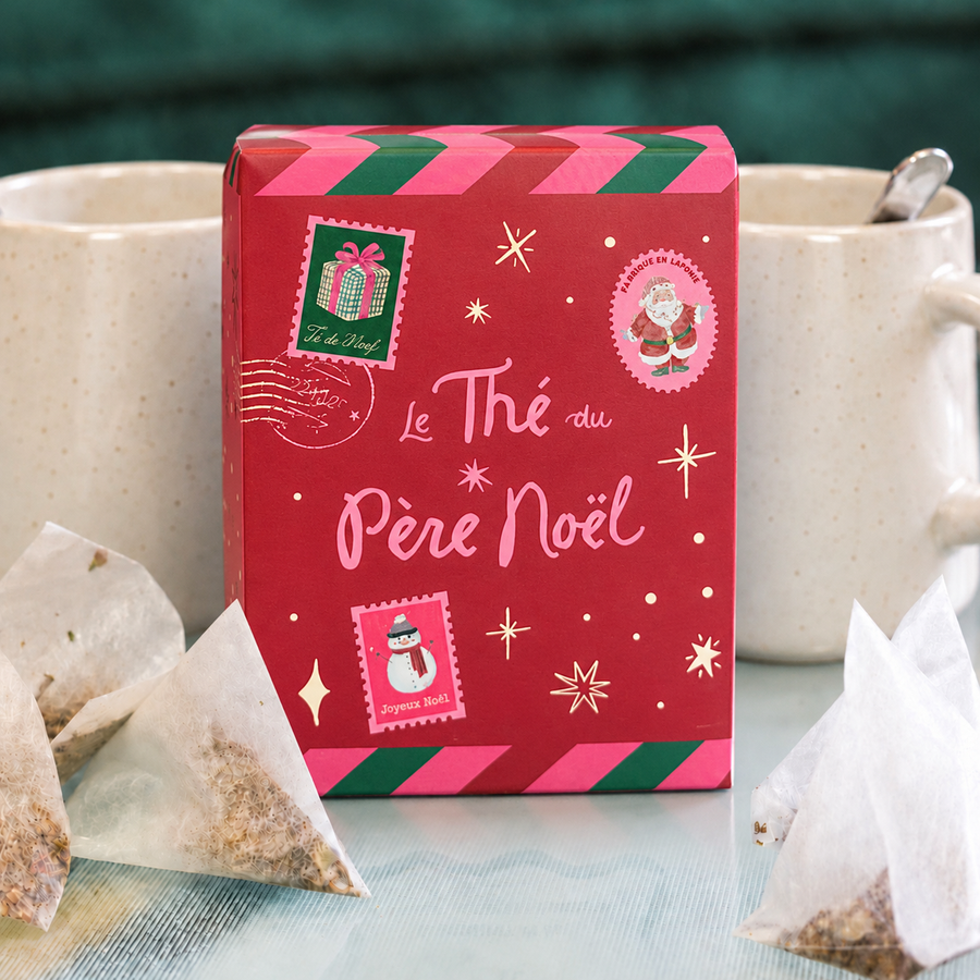 Boîte rouge du Thé du Père Noël avec infusettes visibles
