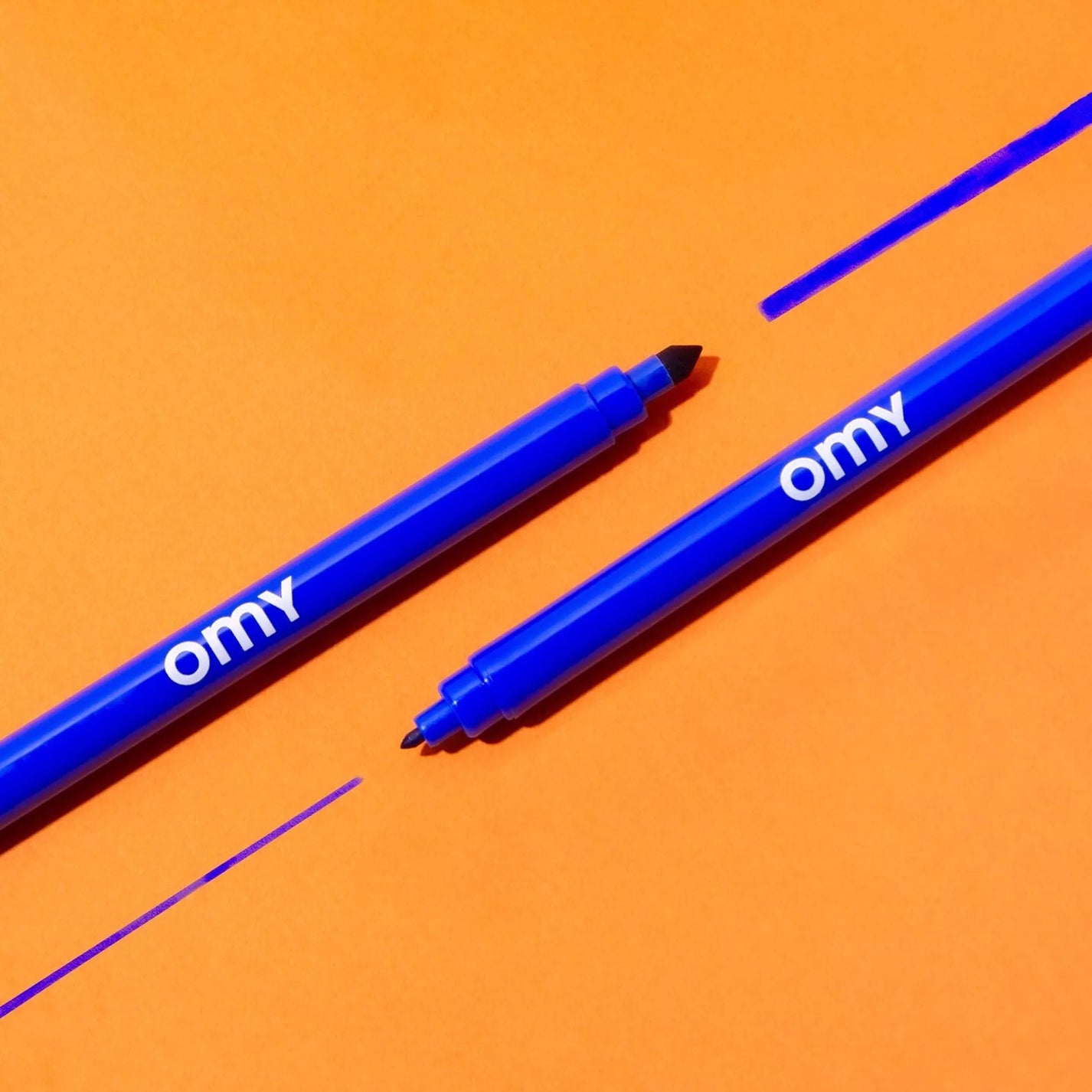 Lot de 16 feutres OMY avec capuchons colorés et motifs variés